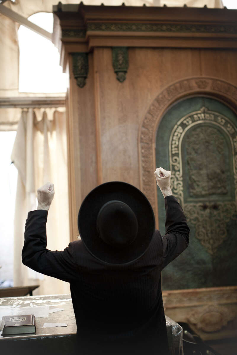 An ultra-Orthodox Jew prays in the synagogue of theTomb of the Patriarchs in November 2009