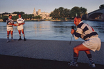 Rugby players taking pictures by the Rhone river. 2000