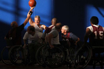 Jim Peterson of the Wheelin' Wildcats, Utah's semi-professional wheelchair basketball team, looked to make a pass during a game against Team Hill at the Hess Fitness Center on the grounds of Hill Air Force Base in Layton, Utah. 