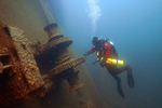 Jim Christenson, a diver with the Great Lakes Shipwreck Preservation Society, explored the stern winch on the Madeira, a schooner barge that sank in Lake Superior on November 28, 1905, at about 65 feet below the surface during a project dive near Split Rock Lighthouse south of Two Harbors, Minn.