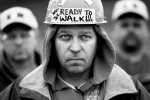 Tim Lutz, a road truck driver at Illinois Cement Co., listened along with more than one hundred other members of United Steelworkers Local 657 during a workers rally in La Salle, Ill. The union had been working without a contract for months and were preparing to go on strike. 