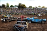 Competitors in the demolition derby, the final event of the Calaveras County Fair & Jumping Frog Jubilee, crash their cars into one another at the Calaveras County Fairgrounds in Angels Camp, California on May 22, 2022. Eighteen drivers competed in the event, which was won by a local high school student. Demolition derby competitions involve contestants driving their cars into each other until only one is left running and is crowed the winner.