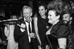 Fashion designer Jean Paul Gaultier, his muse and former model Farida Khelfa and society columnist Jennifer Raiser (left to right) enjoy a private party in Gaultier’s honor to celebrate the opening of an exhibit of his work at the de Young Museum in San Francisco, Calif., on Thursday, March 22, 2012.This photograph is of a candid moment and was not directed in any way.