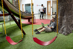 Joshua Carpentier, an employee at the time at a start-up named Essential, works in the playground area at the offices of technology incubator Playground Global in Palo Alto, Calif., on August 16, 2018. Playground funds and supports start-ups developing new technology, with a focus on artificial intelligence. Carpentier says, “I always made a point of going down the slide once a day. It was a good reminder to have fun and never take what you do too seriously.” 