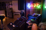 Entrepreneur Gideon Nweze, founder of a blockchain start-up for managing digital currencies, uses the massage chair at Node, a blockchain members club in San Francisco, Calif., on August 9, 2018. Node is a member's club for the blockchain and crypto-currency community and the club functions as a community gathering space and co-working office. 