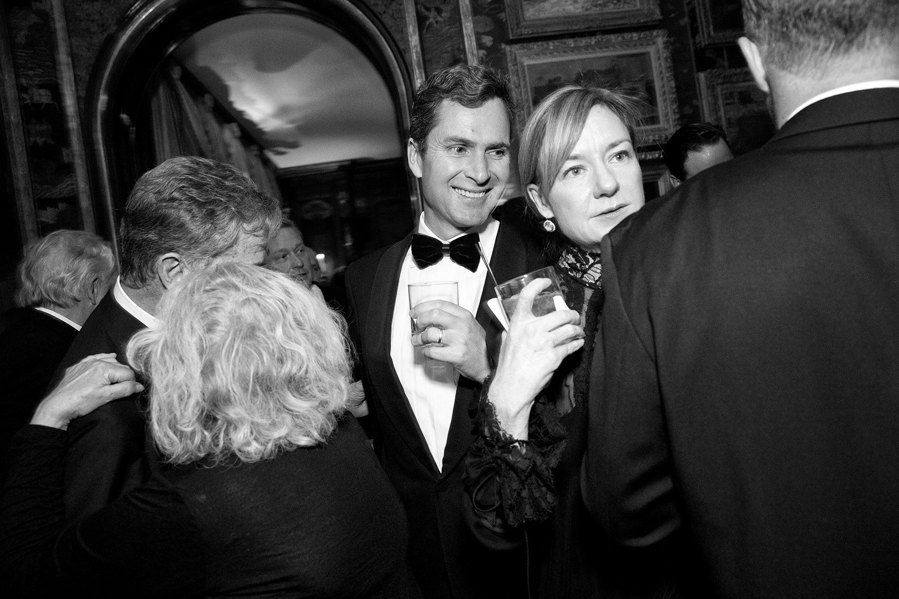 Katie Schwab Paige and her husband Matt Paige make their way through the crowded house of Ann and Gordon Getty during a huge party to celebrate Gordon Getty’s 80th birthday in San Francisco, Calif., on Saturday, December 14, 2013.This photograph is of a candid moment and was not directed in any way.