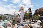 Emily Erickson (center) dances and blows bubbles during a fundraiser party for Disco Chateau, a Burning Man camp, held at the home of a technology entrepreneur in San Francisco, Calif., on Saturday, June 27, 2015. The camp members were raising money to buy more stuffed animals to bring to Burning Man. Their goal was to create a large {quote}cuddle puddle{quote} where people could cuddle with one another among stuffed animals at the annual festival. Participating in Burning Man and the culture surrounding it has become very popular within the technology start-up community.