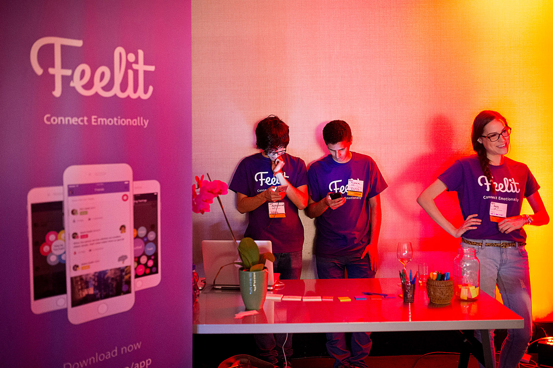 Mohammed Alkadi, Albara Hakami and Abby Wischnia, seen left to right, host a booth for their company Feelit, a social app to help people express their feelings and emotions, during the Startup and Tech Mixer at the W Hotel in San Francisco, California in March 2015. The networking event, which drew hundreds of people from the tech industry hoping to make connections, was for a time, held every few months.