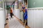 Andrew Ward, right, and Chris Cassano battle their fellow housemates with Nerf guns during an organized Nerf gun battle at 20 Mission, a co-living house in the Mission District, in San Francisco, California in July 2015. The community is home to around 45 people, many of whom are entrepreneurs. Many of the residents are close friends and impromptu gatherings and more formal parties are commonplace at the community. 