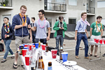 Allen Kleiner (left) and Jonathan Osacky congratulate each other while playing beer pong during a happy hour party at the office of the now defunct crowdfunding start-up Tilt in July 2015. The happy hour was a fundraiser for the organization Girls Who Code and guests were asked to make a donation through the company's website to gain entrance to the event. 