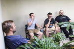 Connor McGill, second from right, smokes cigars with his co-workers on his last day of work at Hackers/Founders, an organization that helps early-stage entrepreneurs located in the Hacker Dojo in Mountain View, California in August 2014. McGill was leaving his job to pursue an undergraduate degree at UC Davis.