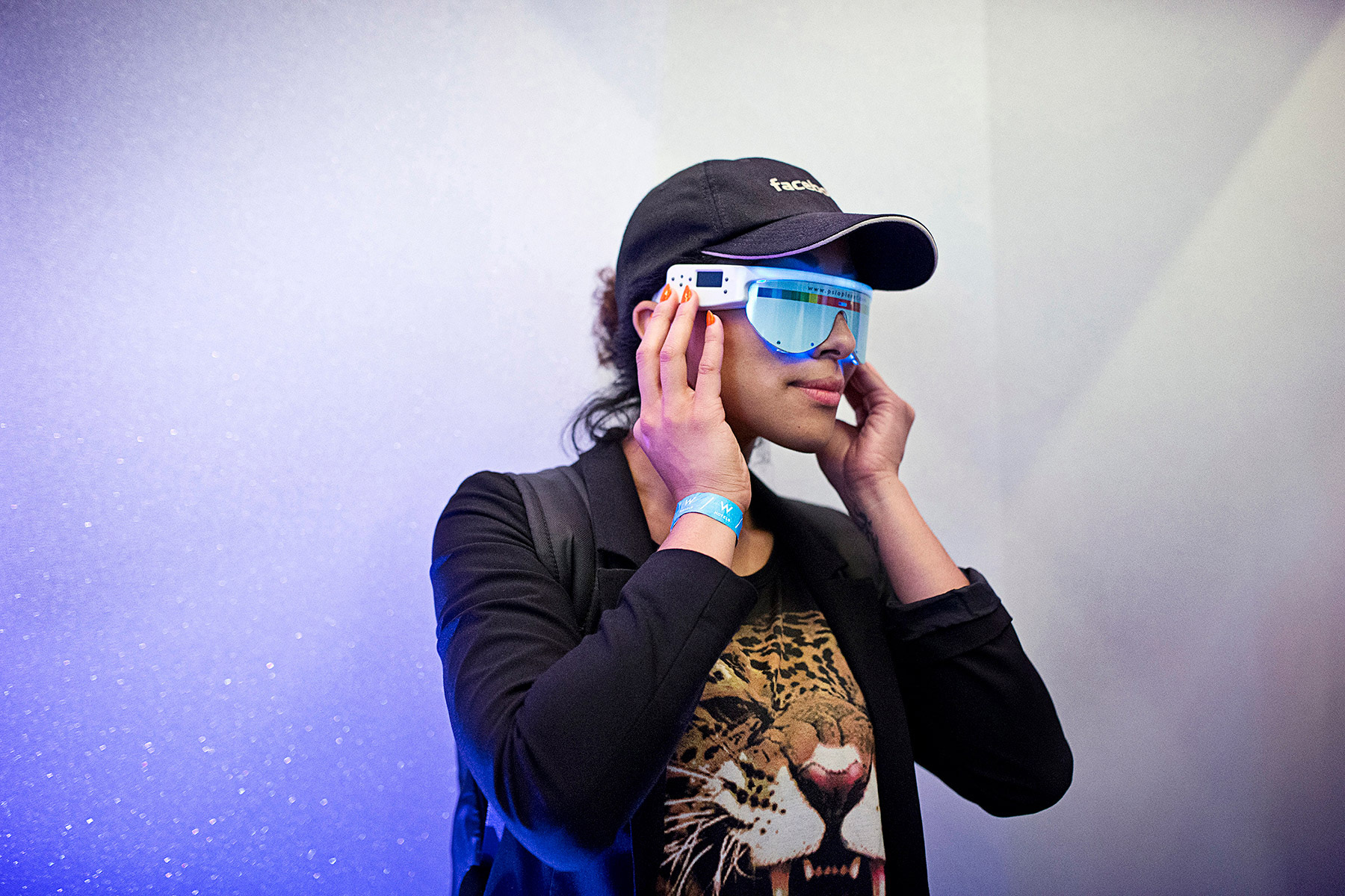 An attendee of the Startup and Tech Mixer tries on a virtual reality product that was on display at the tech networking event at the W Hotel in San Francisco, California in August 2014. The event, which was for a time held once every few months, drew hundreds of attendees looking to make connections in the industry. 