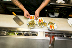Chef Joe Kelly prepares Tricolored Shrimp Roll dishes at A Single Pebble Restaurant in Burlington, Vermont on Tuesday, September 13, 2016.