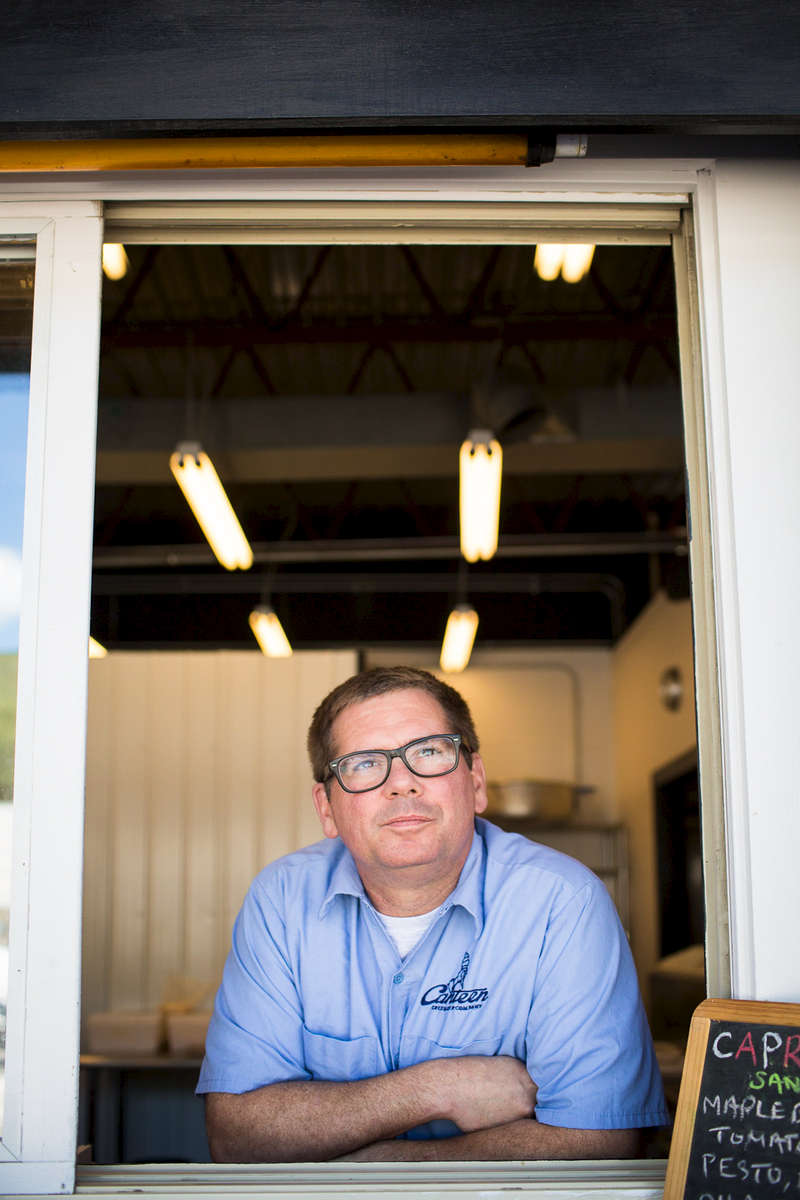 Chef and Canteen Creemee Company founder Charlie Menard poses for a portrait in the window of the Waitsfield snack shack on Thursday, June 23, 2016.  Menard, a longtime chef at Inn at the Round Barn, recently opened the creemee and snack stand on Route 100.