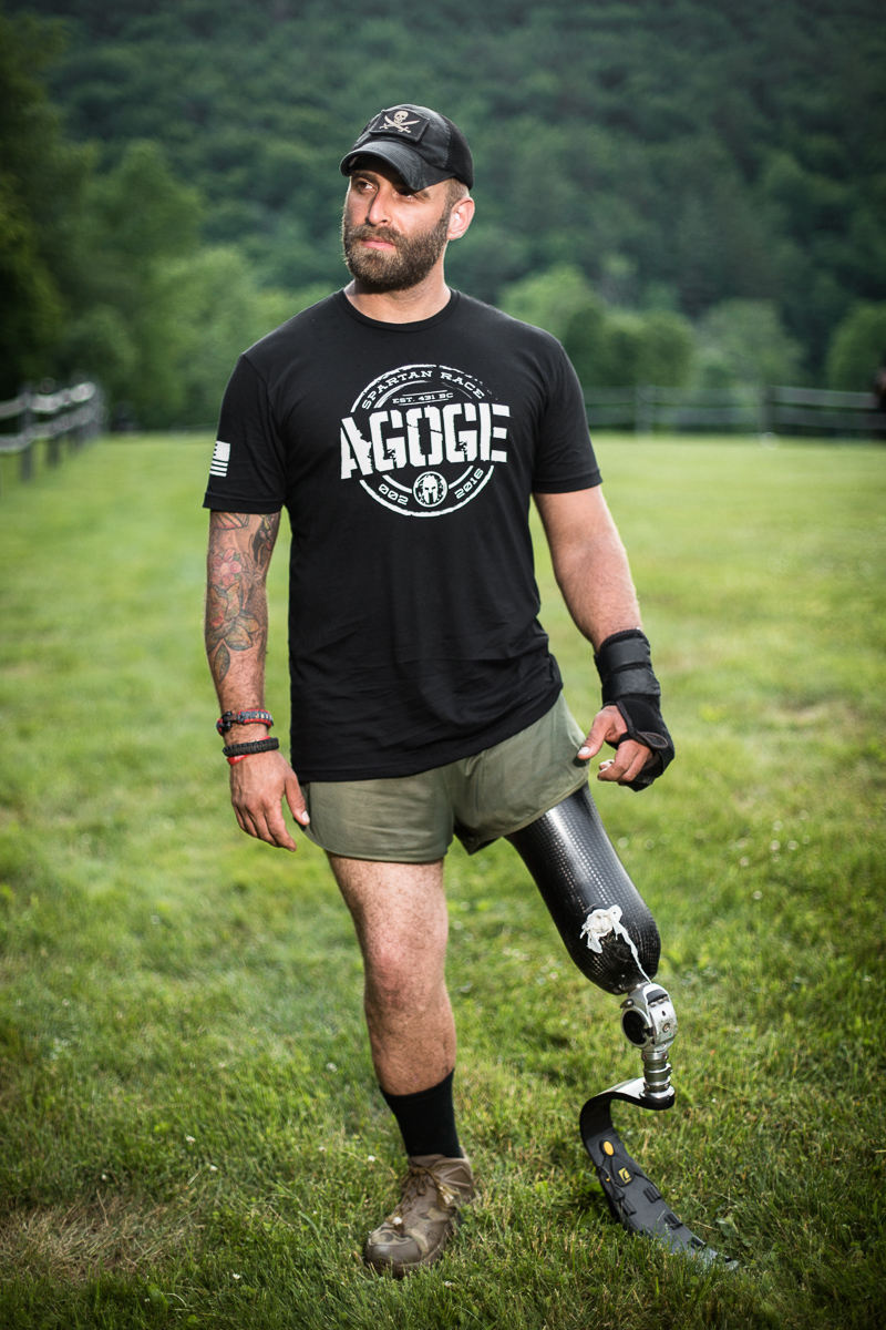 Earl Granville poses for a portrait against a picturesque landscape at the 2016 Agoge 60 Spartan Race at Riverside Farm in Pittsfield, VT. 