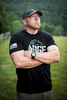 Mark Peterson poses for a portrait after the Agoge 60 Spartan race on Sunday, June 19, 2016, at Riverside Farm in Pittsfield, Vermont.