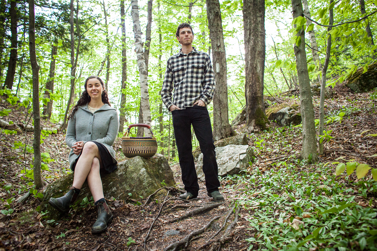 Jenna Antonino DiMare and Ari Rockland-Miller of The Mushroom Forager pose for a portrait during a foraging session in the woods of Vermont.