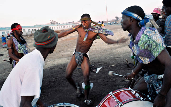 Several Zulus perform Mangwe, a traditional Zulu warrior dance.