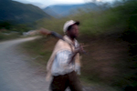 An Afro-Bolivian hunter returns home at the end of the day in the lush Yungas Valley.