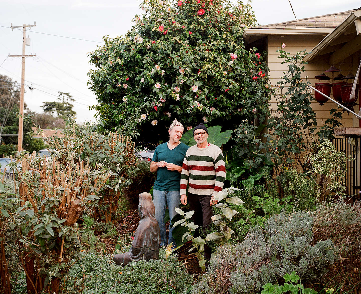 David Spiher (left) and Ralph Thurlow stand in their front home in Hayward, Calif. on December 4, 2016. The couple has been facing Ralph's health challenges around HIV-Associated Neurocognitive Disorder. The couple was part of the Chronicle's first feature film called Last Men Standing about long-term HIV survivors. 