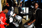 Members of the drum corp including Ja'sean Falls, 11, Correy Williams, 14, Nick Blakely, 13, and James Lee IV, 14, wait to take the marching line back to the parking lot for practice after lunch.  With just a week to go until the Holiday Parade through downtown Asheville, the Hillcrest High Steppin' Majorettes and Drum Corps practice all Saturday afternoon.11-10-12 - Erin Brethauer (ebrethau@citizen-times.com)