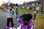 Drum major Rico Griffin, 20, left, leads a small group of younger Hillcrest High Steppin' Majorettes, including Chyna Jones, 10, through an extra practice at the Hillcrest Apartments complex Monday afternoon during a day off school.  Griffin took the bus to Hillcrest to lead the practice before the team's official practice later in the evening.11-12-12 - Erin Brethauer (ebrethau@citizen-times.com)