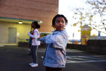 Lonna Hayes, 6, practices with members of the Hillcrest High Steppin' Majorettes and Drum Corps on a cold Tuesday evening.11-13-12 - Erin Brethauer (ebrethau@citizen-times.com)
