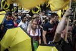 June 17, 2017 - Berlin, Germany: Supporters of the Identitarian Movement shout slogans and wave flags as they march  on Brunnenstrasse in Wedding district.  The Identitarian Movement originated in France and with its ideology of a racially-based concept of European identity has drawn right-wing supporters across Europe. The movement has positioned itself against the acceptance of Muslims and Islam in Europe and has also sought to stop immigration from non-European nations.