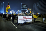 January 19, 2015 -Germany,  Berlin, Berlin: Protesters hold a placard that reads: 'Stop the Islamization of Europe' at an Anti-Islam protesters march during a BERGIDA rally, a local copycat of Dresden's right-wing populist movement PEGIDA (Patriotic Europeans Against the Islamisation of the Occident), at Alexander Platz in Berlin, eastern Germany. The planned  Dresden demonstration rally by the anti-Islamic Pegida movement  was banned by German police with other public open-air gatherings in the eastern city of Dresden on Monday, citing a terrorist threat. 