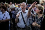 August 19, 2016 -Schwerin, Germany: Angry supporters threaten journalists as they  applaud and shout: 'Hoecke, Hoecke' while  they listen to Bjoern Hoecke, head of the Alternative fuer Deutschland political party (Alternative for Germany, AfD) in Thuringia and Holm, lead candidate for the AfD in Mecklenburg Western Pomerania. Both agitate a small crowd at an AfD party rally. The anti-immigration party is surging after Germany took in most of the more than 1 million refugees who arrived in the European Union last year. The party’s rise is narrowing coalition-building options for Germany’s established parties and threatens the status quo nationwide. Polls suggest the AfD will win up to 19% of the votes in this east German state of Mecklenburg-Western Pomerania, where Germanys Chancellor Merkel has her electoral district. 