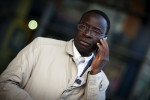 Senegalese born Karambe Diaby , Social Democratic candidate for the German Parliament talks to his aides on the phone while on the campaign trail in his constituency in Halle/Saale. Diaby, a PhD in chemistry, canvassed the former hub for East Germany's chemical industry to become the first black member of the Bundestag in German history. 