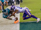 PHILADELPHIA, PA - OCTOBER 07: Running back Wendell Smallwood #28 of the Philadelphia Eagles scores a two-point conversion against cornerback Mike Hughes #21 of the Minnesota Vikings during the fourth quarter at Lincoln Financial Field on October 7, 2018 in Philadelphia, Pennsylvania