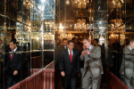 Former New York Governor David Paterson is directed through a hall at Maestros Restaurant in the Bronx