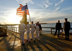The color guard marches down the pier at the Douglaston Yacht Club's annual event 