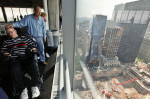 Gordon Schei, 25, who was severly wounded in his brain while in combat, visits 7 World Trade Center throught the Wounded Warrior project for the first time, looking out on the scene of a disater that inspired him to enlist in the military. 