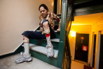 Lordes Flores, 43, who is wheelchair bound and handicapped with multiple sclerosis, has to crawl every day up and down 4 flights of stairs here at her Brooklyn apartment building 