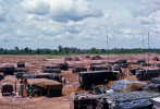The 3rd of the 13th Field Artillary has the M109 self propelled 155 mm howitzers in position, across the middle of the picure, at FSB Hampton on the southeast edge of Go Dau Ha, South Vietnam. Section 3, the {quote}Base Piece{quote}, is at the far left edge with Section 2 in the center and Section 1 at the right. An M88, with the boom extended, is seen in the distance working with an M113, APC.
