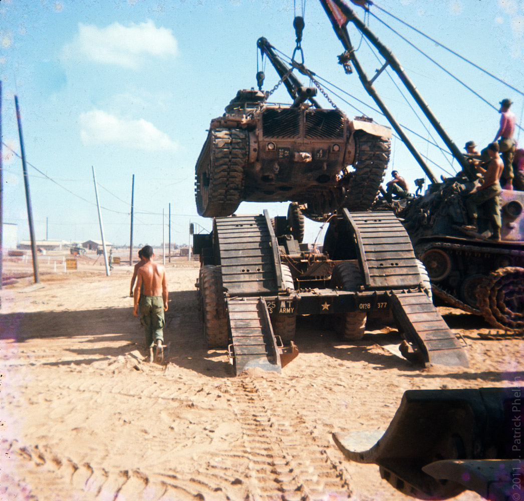 The M48A3 A37 is lifted onto a flatbed by 2 M88 VTRs to be shipped off to probably be retrofitted for a new life.  Stripped down the M48 weighed in at 52 tons.  The replacement tanks for the M48s were M551 Sheridans that weighed in at 17 tons.