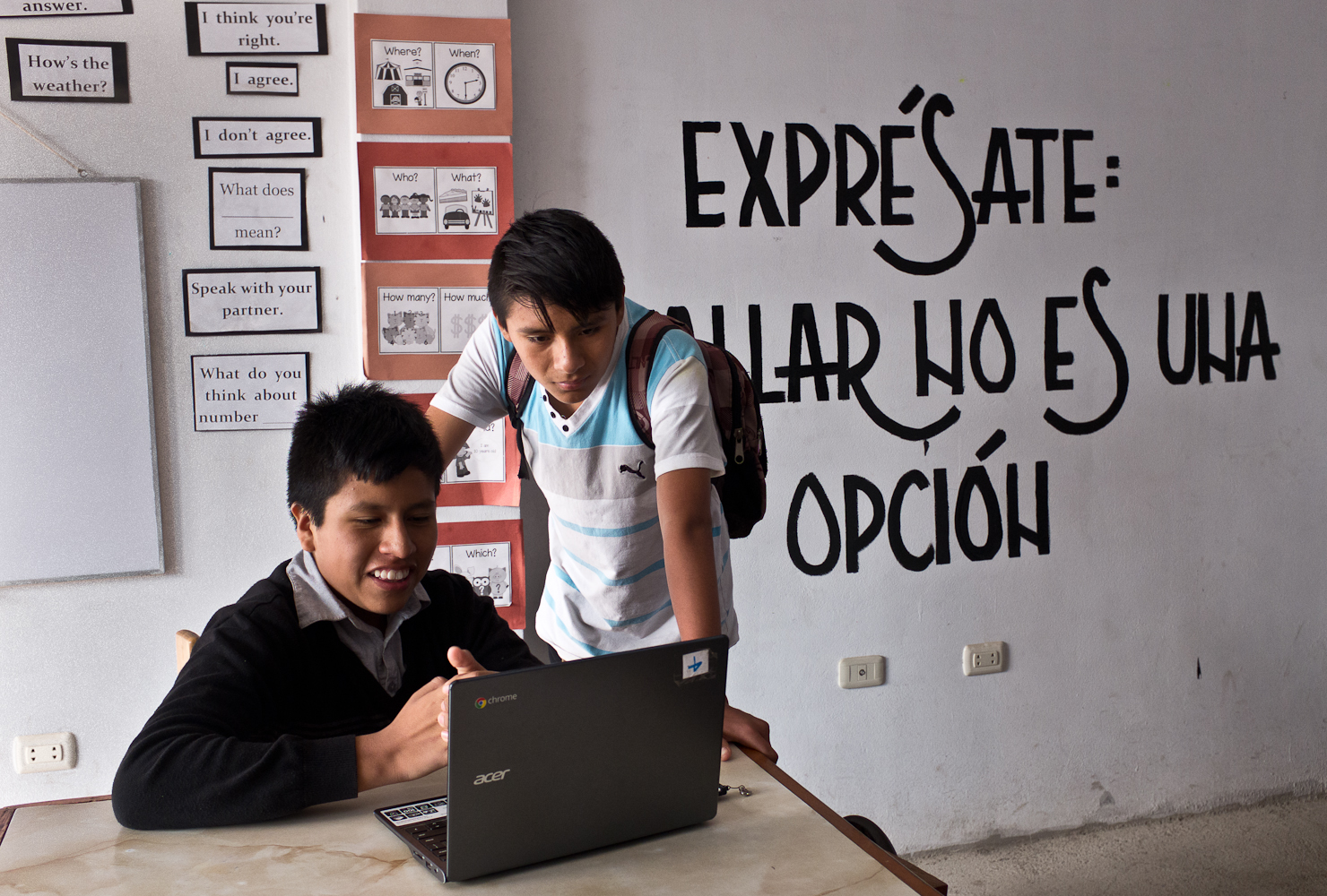 Two boys look at content on a laptop at the clubhouse of Light and Leadership, an NGO that serves the local community in the outskirts of Lima with educational and youth-focused programs. Staff at the organization provide computer literacy classes for woman and access to computers and laptops for teens that come to the clubhouse in the afternoons following school.Light and Leadership recently purchased refurbished computers from a U.S. entity specializing in loading educational software. I visited them to meet people who had directly benefited from access to such refurbished technology.