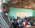 Steve, 20, listens as a guest lectures at his social studes class. Like the other STARS orphans who are volunteer teachers at St. Luke's, he also teaches math and physics. He is determined to see that more girls in rural Kenya receive a secondary school education.