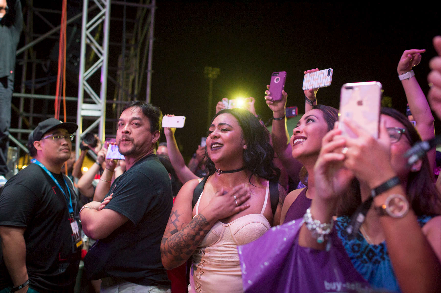 The fans were celebrating all through the night during the Boyz II Men concert at the Paseo Stadium on Guam. (Dec. 15, 2017)Photo by Nancy Borowick