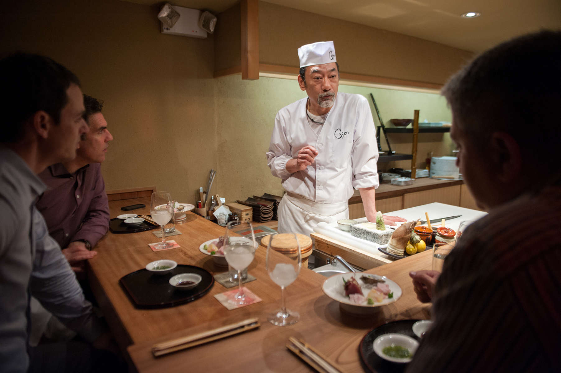 Chef Toshio Tomita presents diners with one of their many courses, offering up a collection of seafood items, such as Snapper, Grouper and baby Bluefish at this East Village establishment. (Apr. 23, 2014)Photo by Nancy Borowick