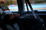 Edward sleeps as he leaves Richmond at 5 a.m. heading to Philadelphia to be checked for a skin infection, one of many medical issues, he has. He got a ride from volunteers of ACCA Temple of Richmond to Shriners Hospitals for Children in Philadelphia. Edward's feet have opened wounds by pressure from his bones as gunshots paralyzed Edward from the waist down.