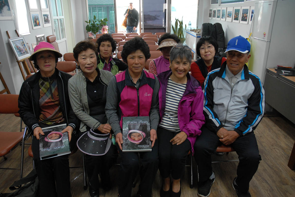 Author with a group of haenyeo, including Im Seong-ok (right)--one of the few male divers on Jeju Island. Middle front row: Cho Jeong-sun, one of the haenyeo of Sagye village.