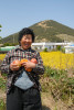 Woo Sun-deok, a haenyeo widow who lives and works in Jongdal village.