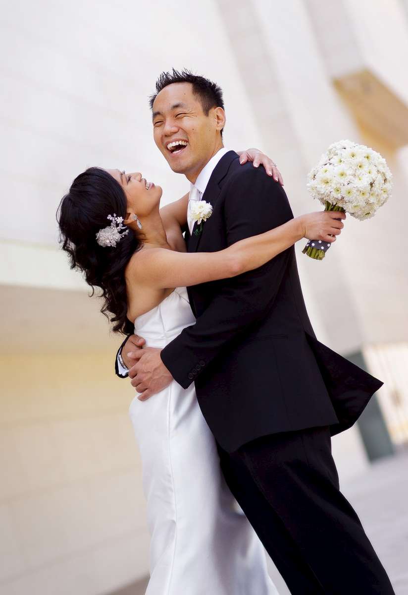 -Ren_e-and-Henry-Segerstrom-Concert-Hall-portrait-with-bride-and-groom