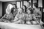 bridesmaids-jumping-on-bed