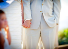 close-up-bride-and-groom-hands-wedding-ceremony