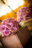 close-up-of-purple-roses-in-brides-bouquet