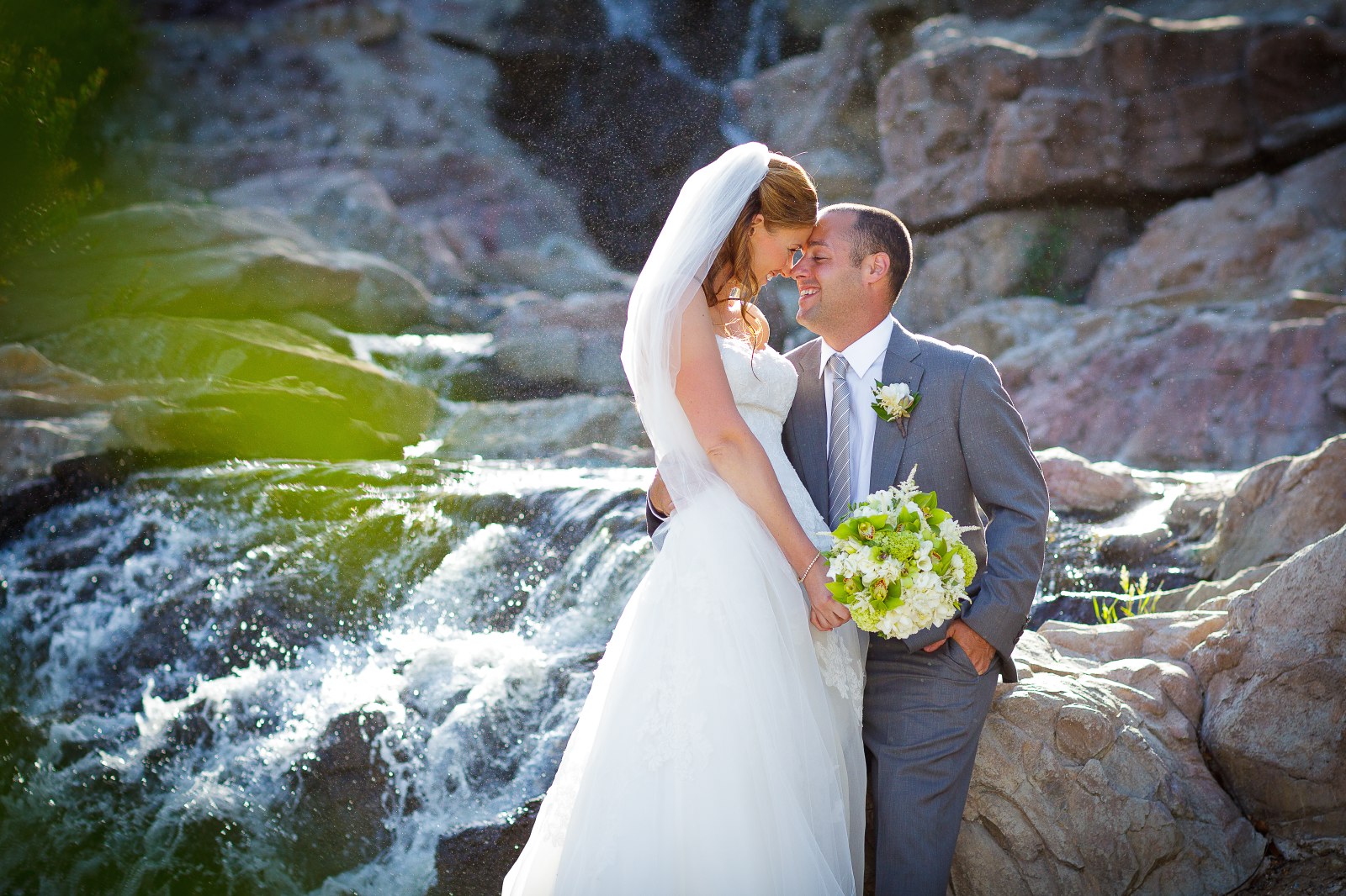 waterfall-at-dove-canyon-with-bride-and-groom-